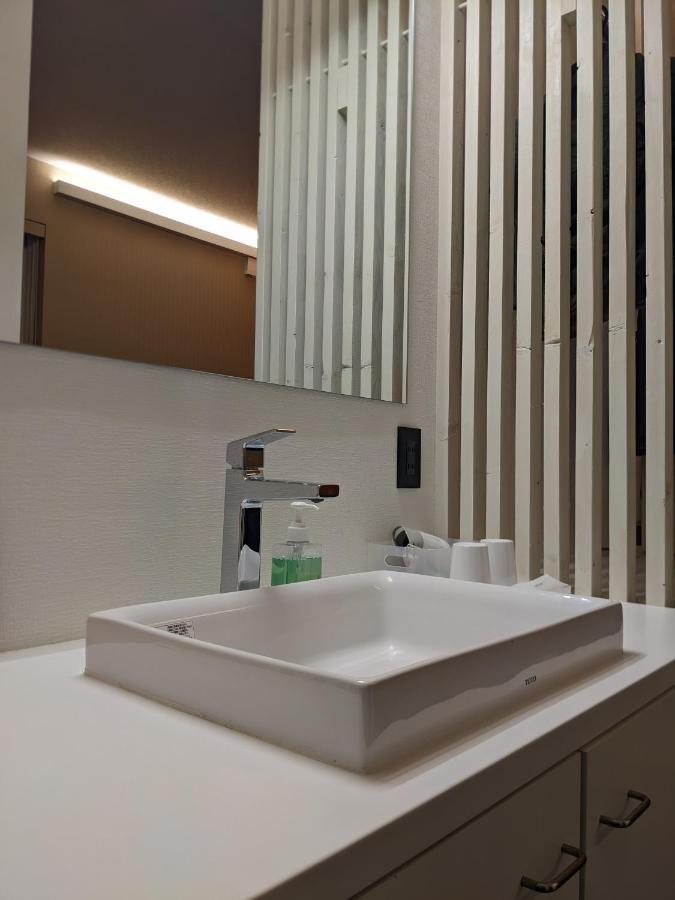 Tbox Hotel Kutchan Bagian luar foto